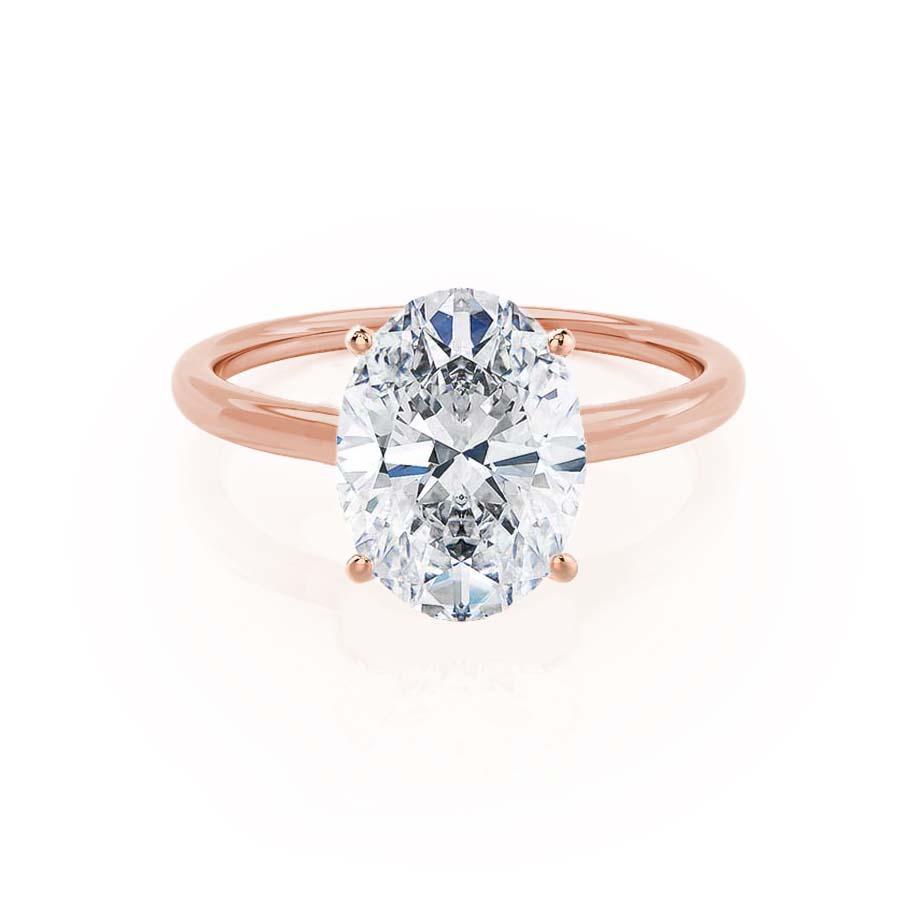 Front view of oval lab diamond solitaire engagement ring in 18k rose gold