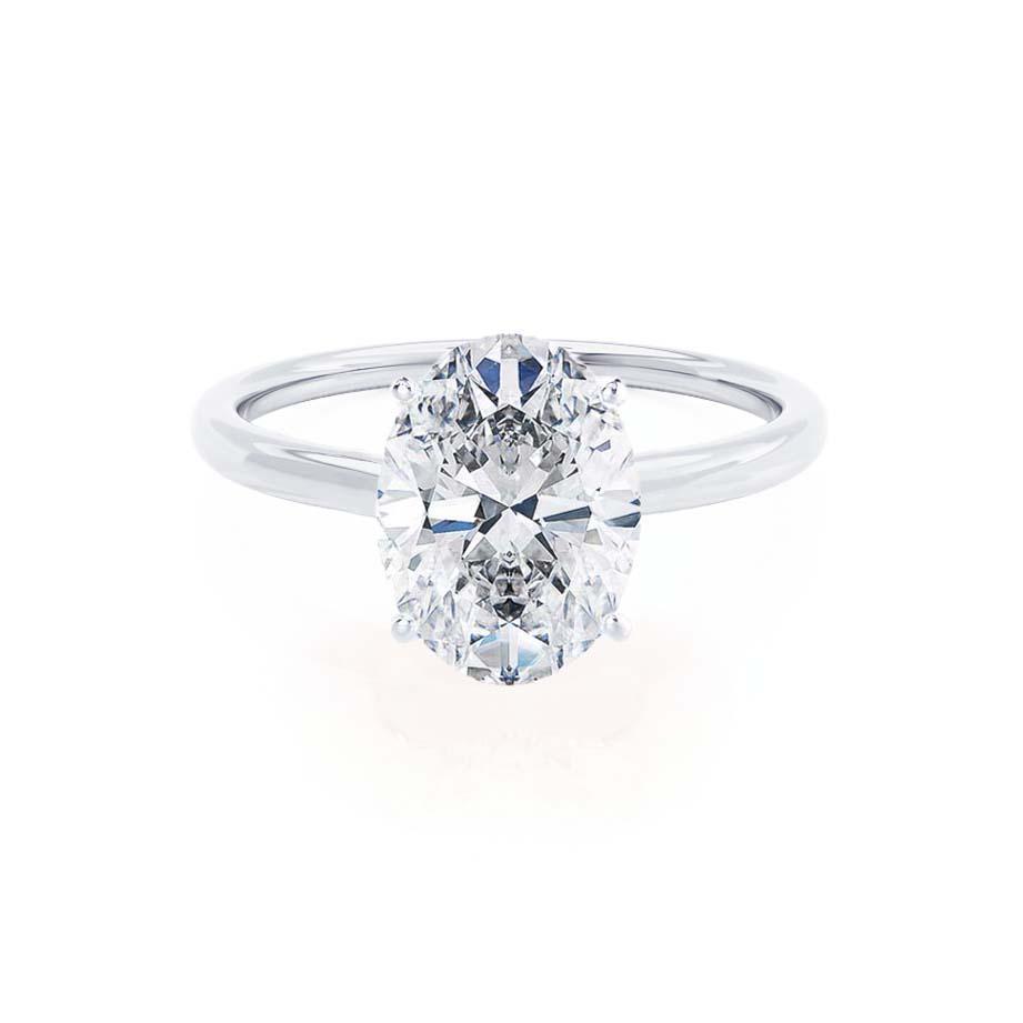 Front view of oval lab diamond solitaire engagement ring in 18k white gold