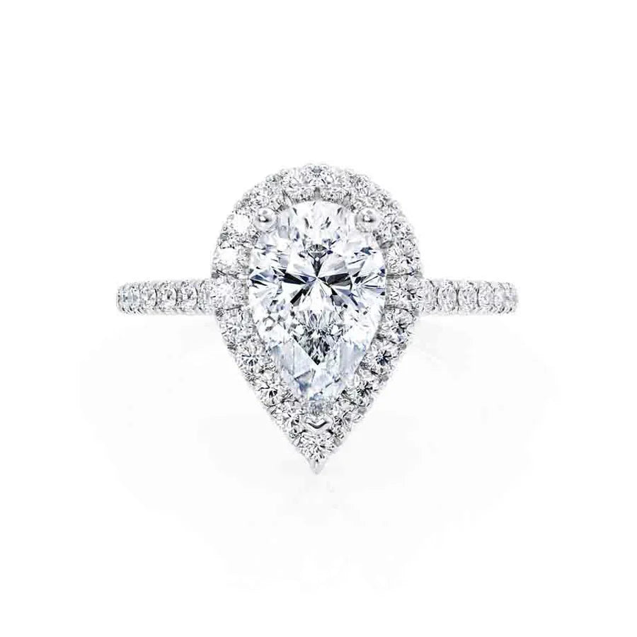 Top view of pear-shaped lab diamond petite halo engagement ring in platinum