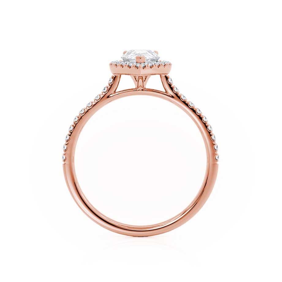 Side view of pear lab diamond halo engagement ring in 18k rose gold with pavé band
