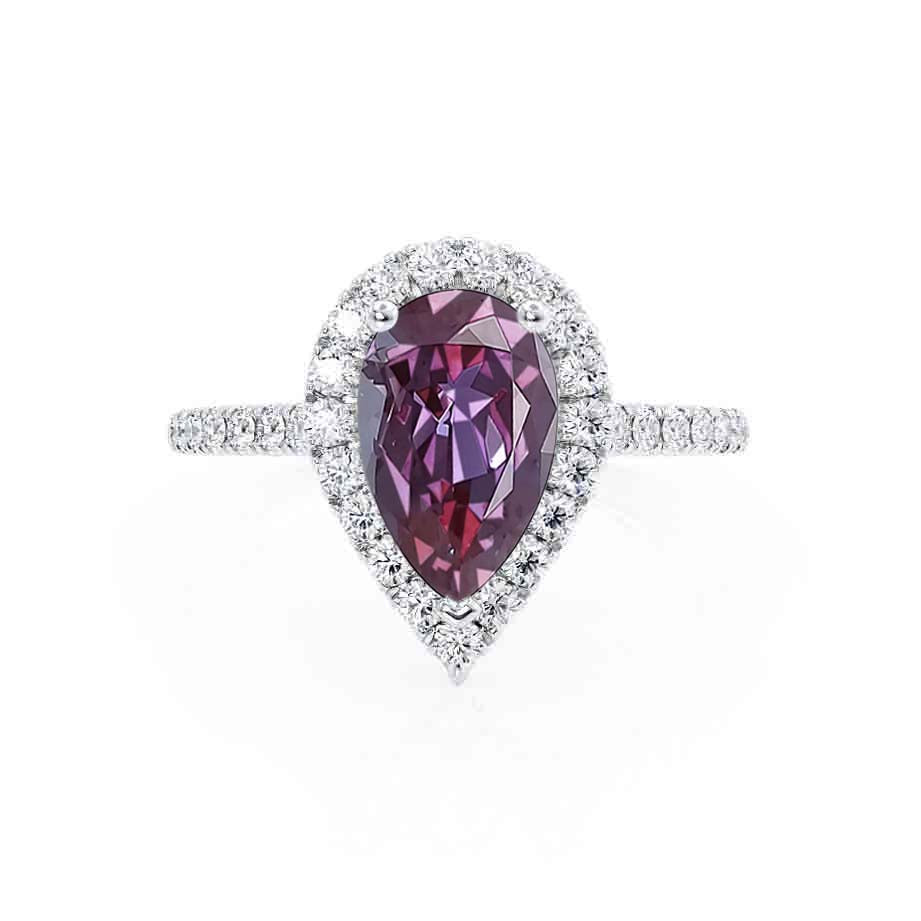 Angled view – Captures the brilliant contrast between the halo diamonds and the Alexandrite’s enchanting hues.