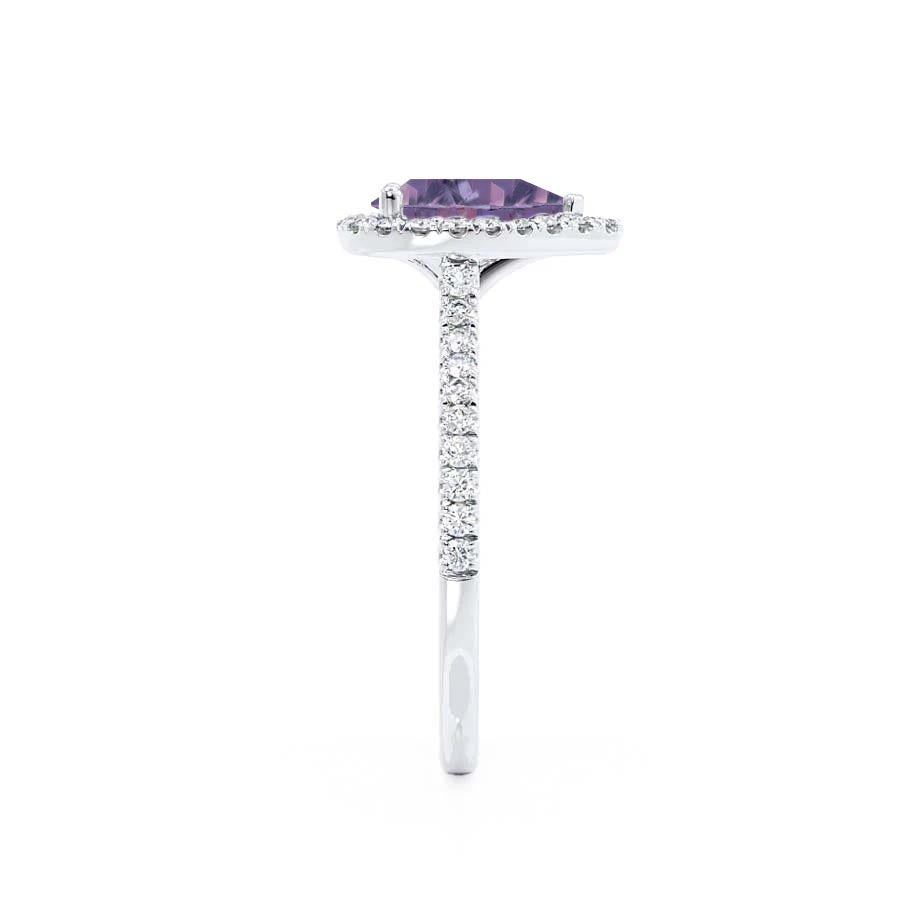 Side view – The setting’s height and delicate cathedral style in 950 platinum enhances light reflection from every angle.
