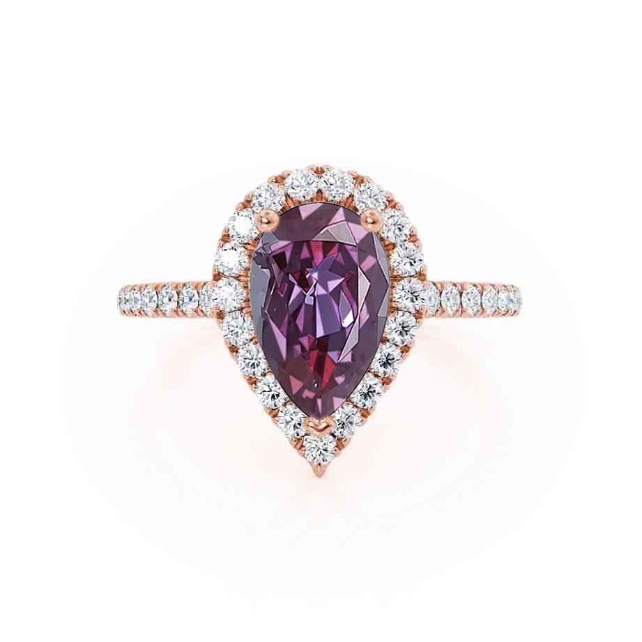 Angled view – A delicate pavé halo and soft rose gold tones frame the color-shifting gem in feminine elegance.