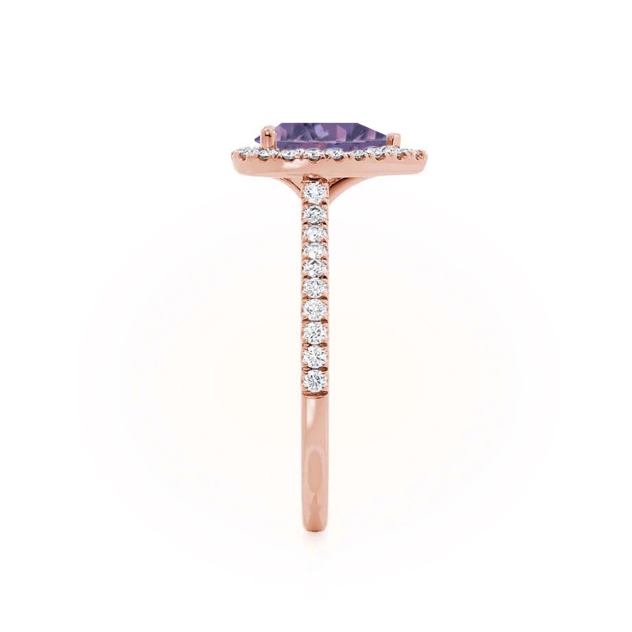 Side view – Showcases the raised setting and dainty diamond gallery from a side profile in 18k rose gold.