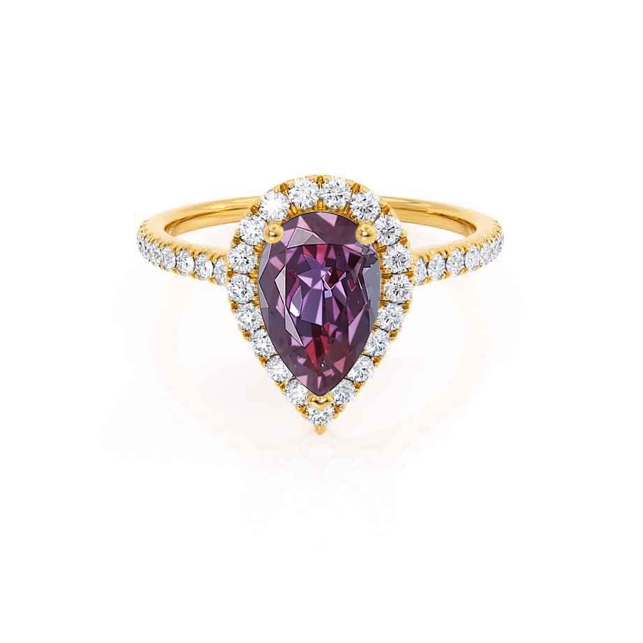 Front view – A radiant lab-grown Alexandrite glows from the center, embraced by a golden pavé diamond halo.