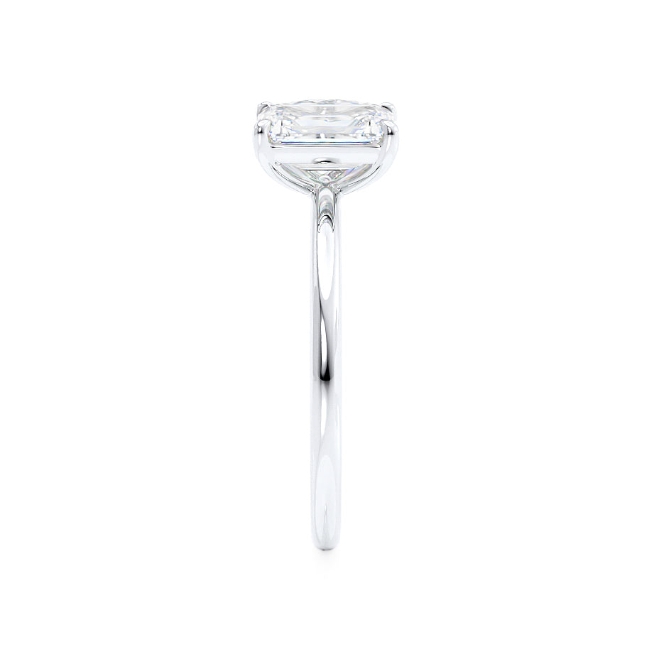 Side view of emerald-cut and pear-cut lab diamond Toi Et Moi ring in platinum