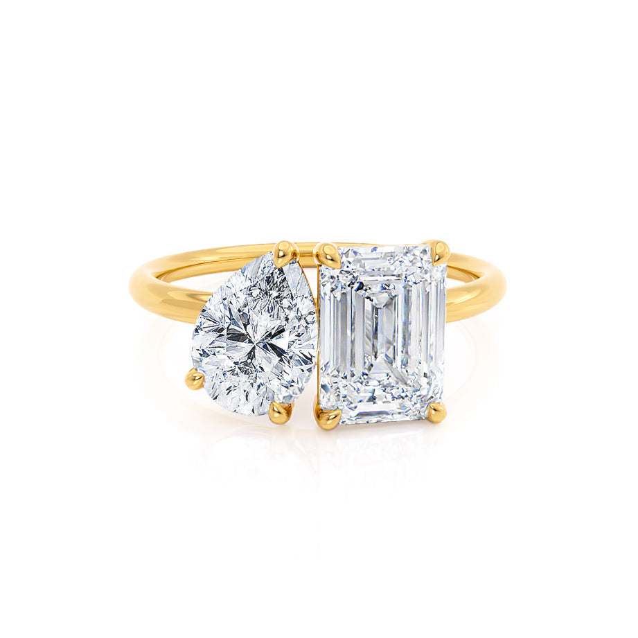 Toi Et Moi engagement ring with emerald-cut and pear-cut lab diamonds in 18k yellow gold, front view