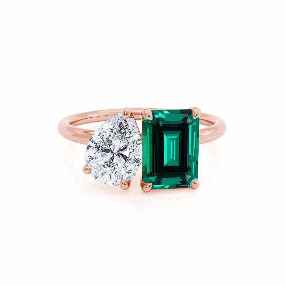 Front view – Showcases the duo-stone balance of the pear-cut lab diamond and emerald-cut green emerald in a warm 18k rose gold setting.