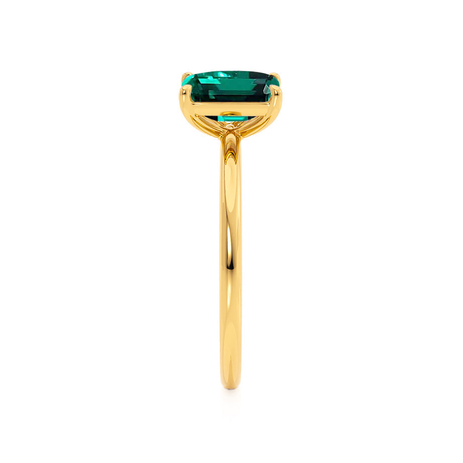 Side view – Side profile reveals the graceful elevation and split-prong setting in radiant yellow gold.